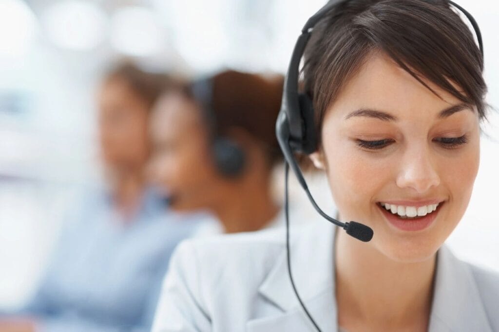 Smiling woman wearing calling headset